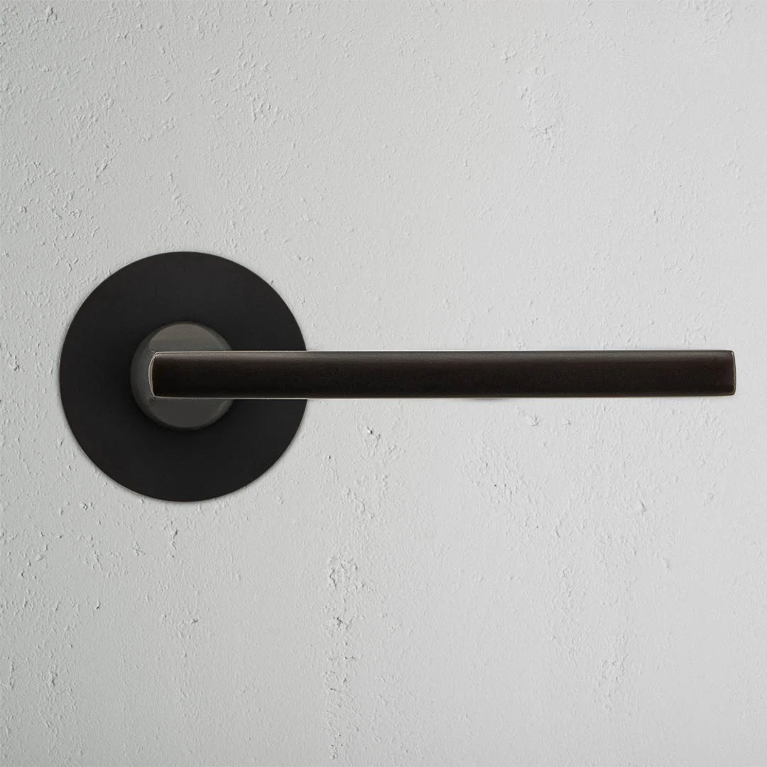Clayton Sprung Door Handle With Flush Rose - Bronze - Image 2