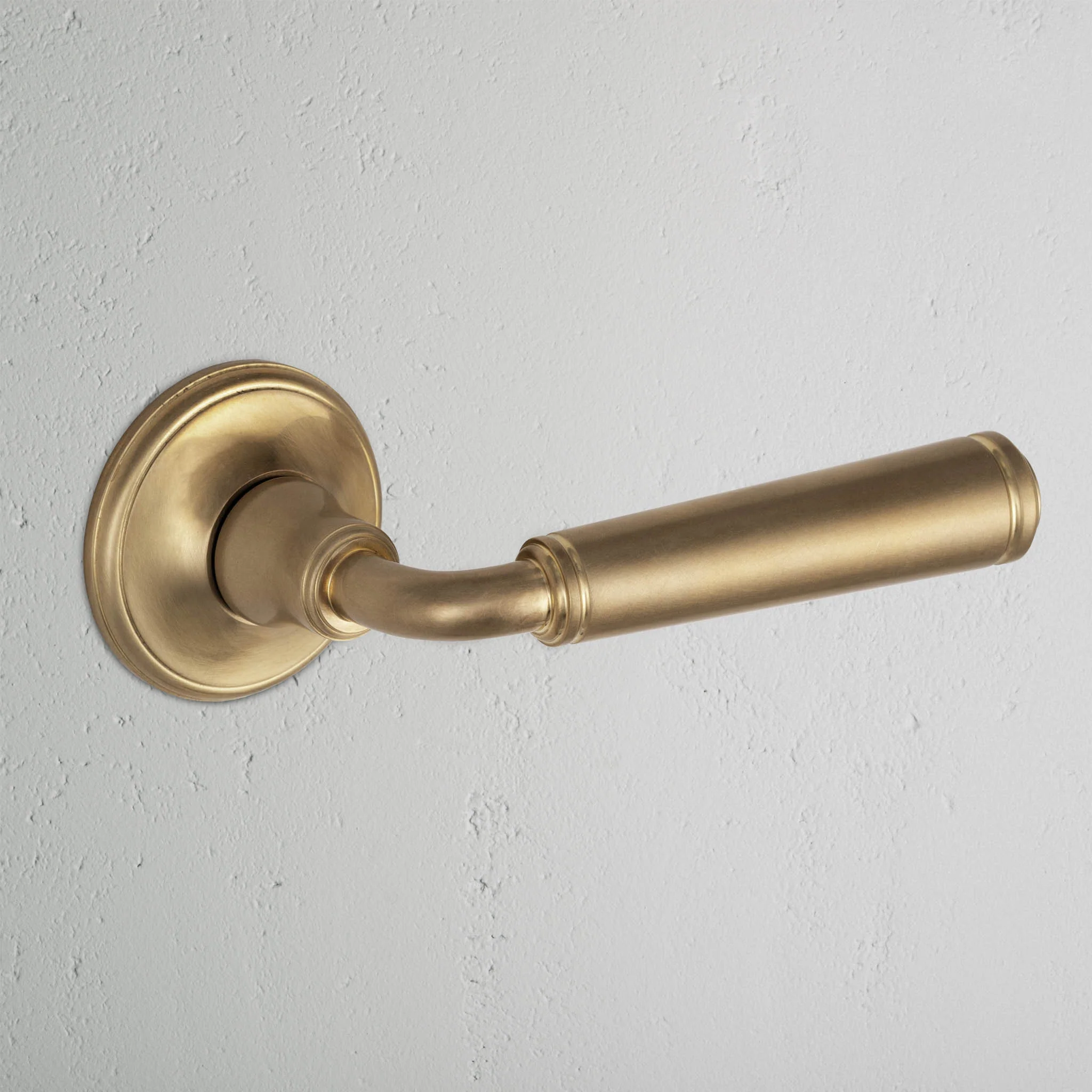 Digby Sprung Door Handle - Antique Brass