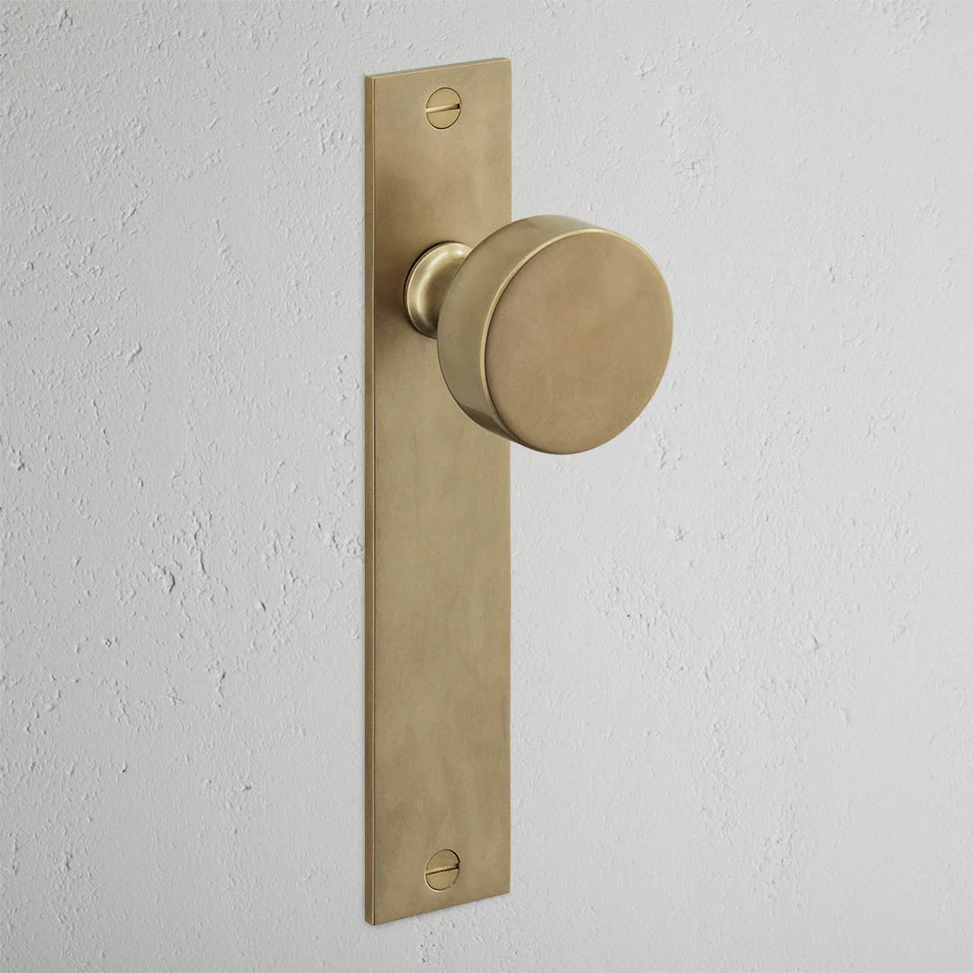 Onslow Long Plate Sprung Door Knob – Antique Brass  - Image 2