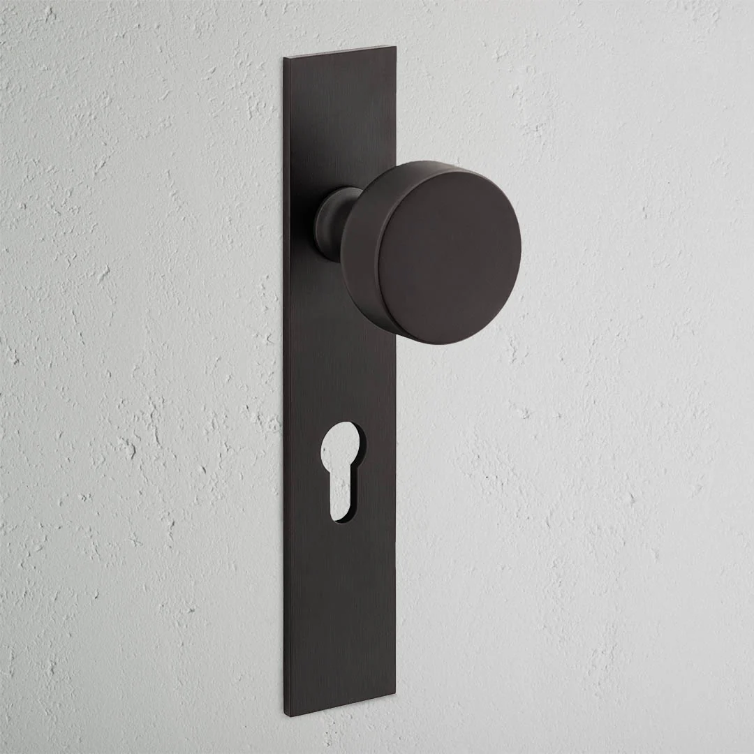 Onslow Long Plate Sprung Door Knob & Euro Lock - Bronze