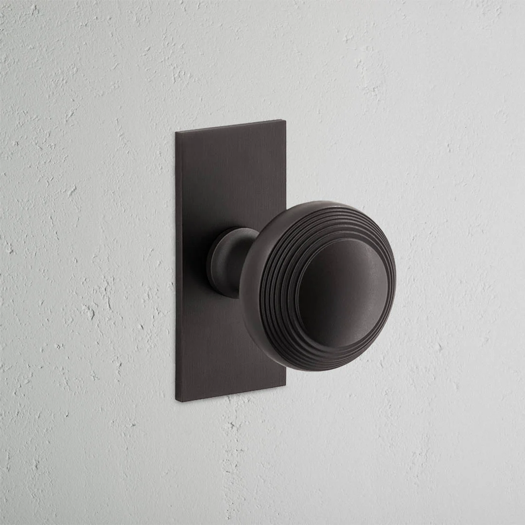 Poplar Short Plate Unsprung Door Knob - Bronze
